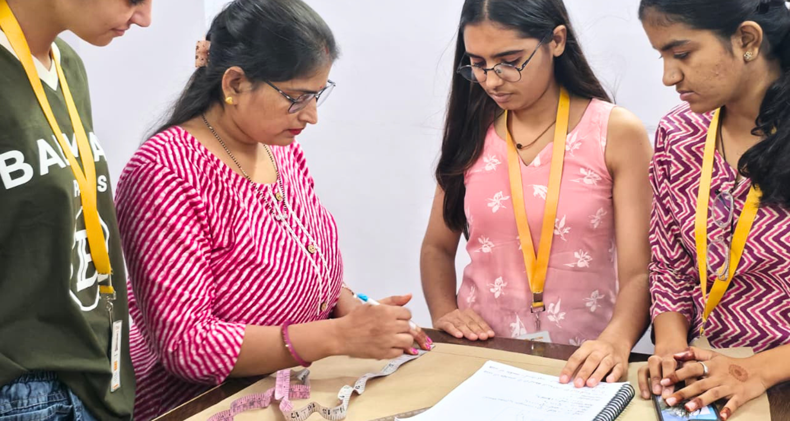 A LIPS student developing a garment pattern during practical training