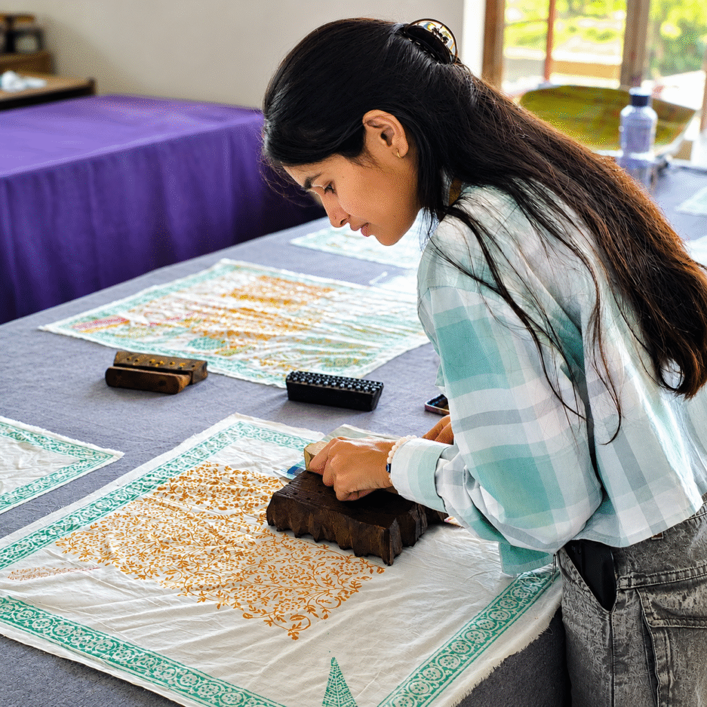 Artisan practicing Bagru Dabu mud-resist block printing in Rajasthan