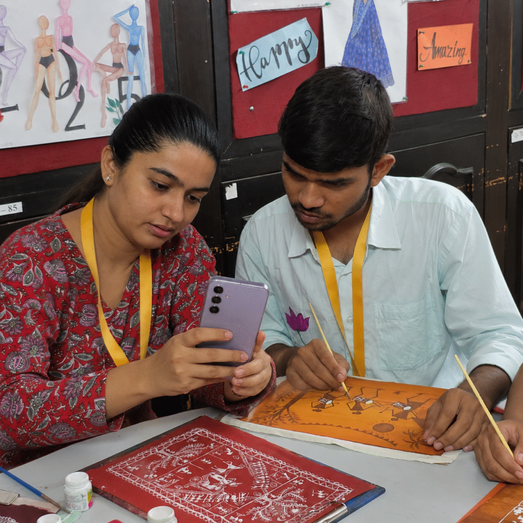 Fashion design student reviewing portfolio photos on phone at LIPS Jaipur