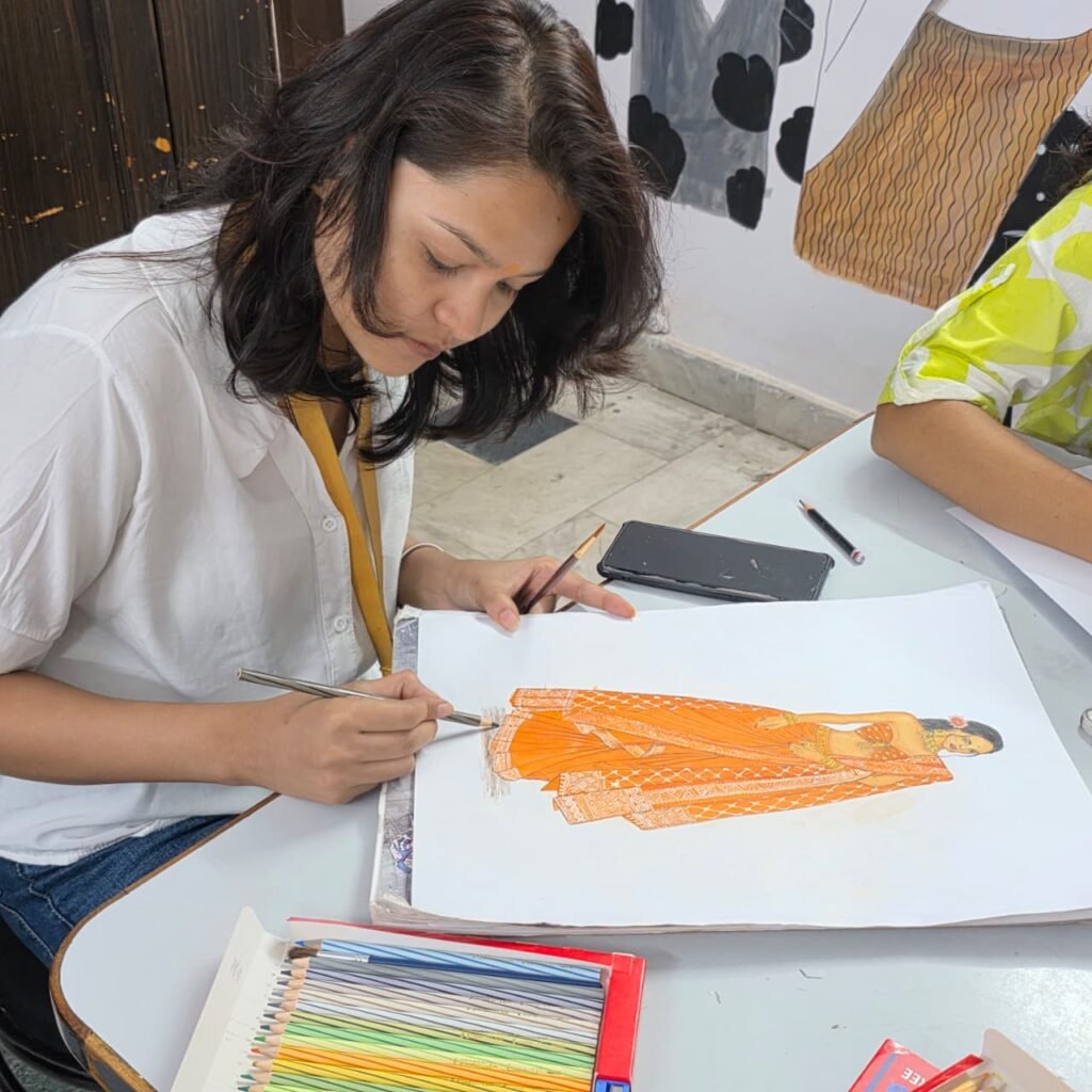 Fashion illustration practice during the LIPS fashion designing course